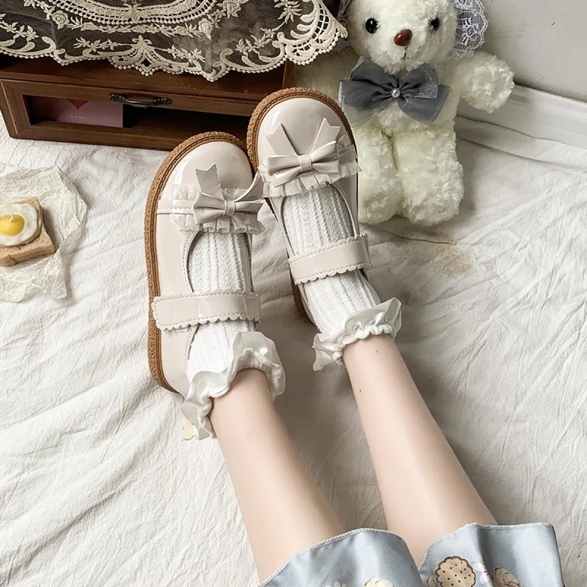 Dolce fiocco Mary Jane scarpe da donna in pelle verniciata tacchi bassi scarpe Lolita donna pizzo fondo spesso scarpe cosplay po
