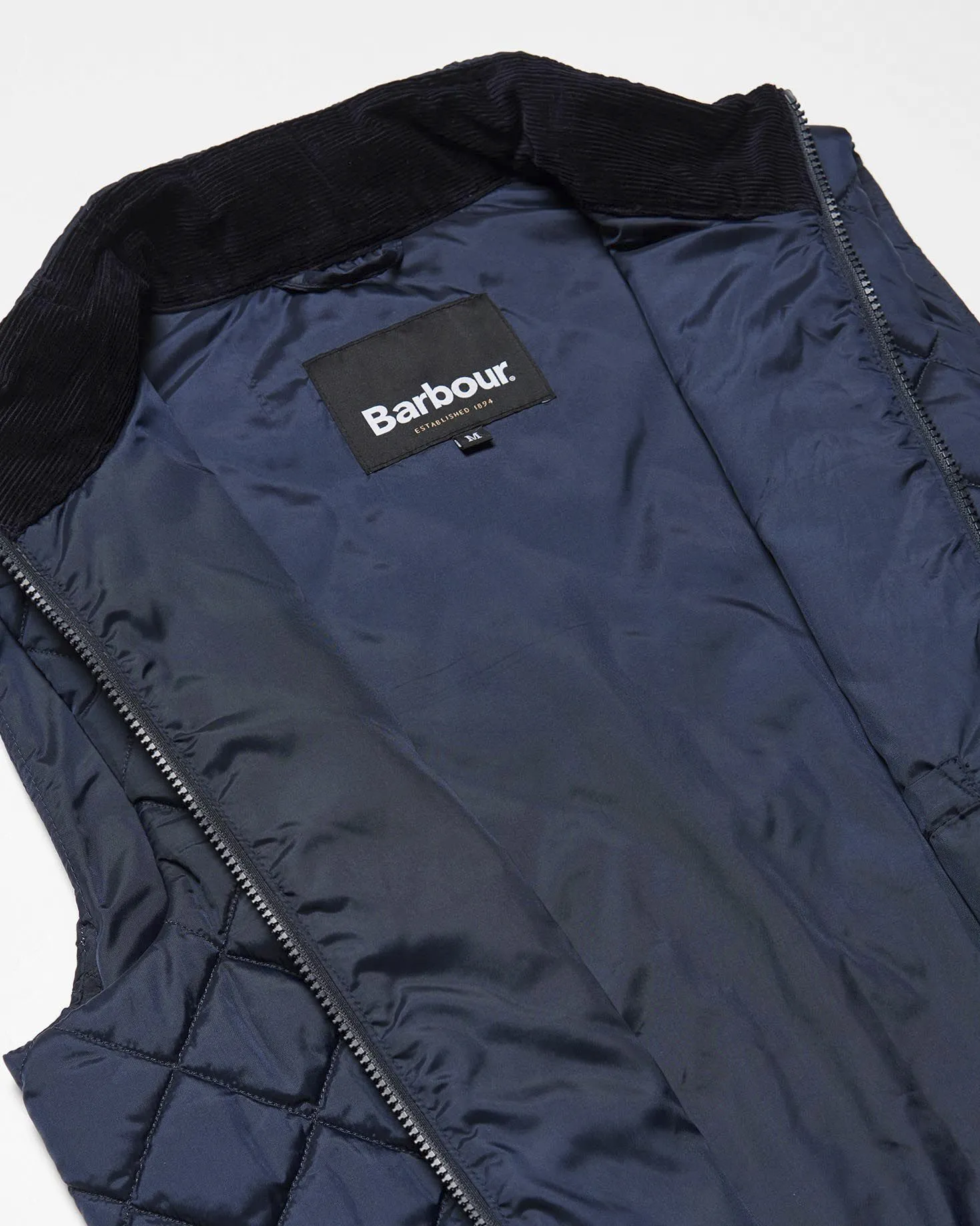 Gilet Monty blu trapuntato a rombi con colletto in velluto