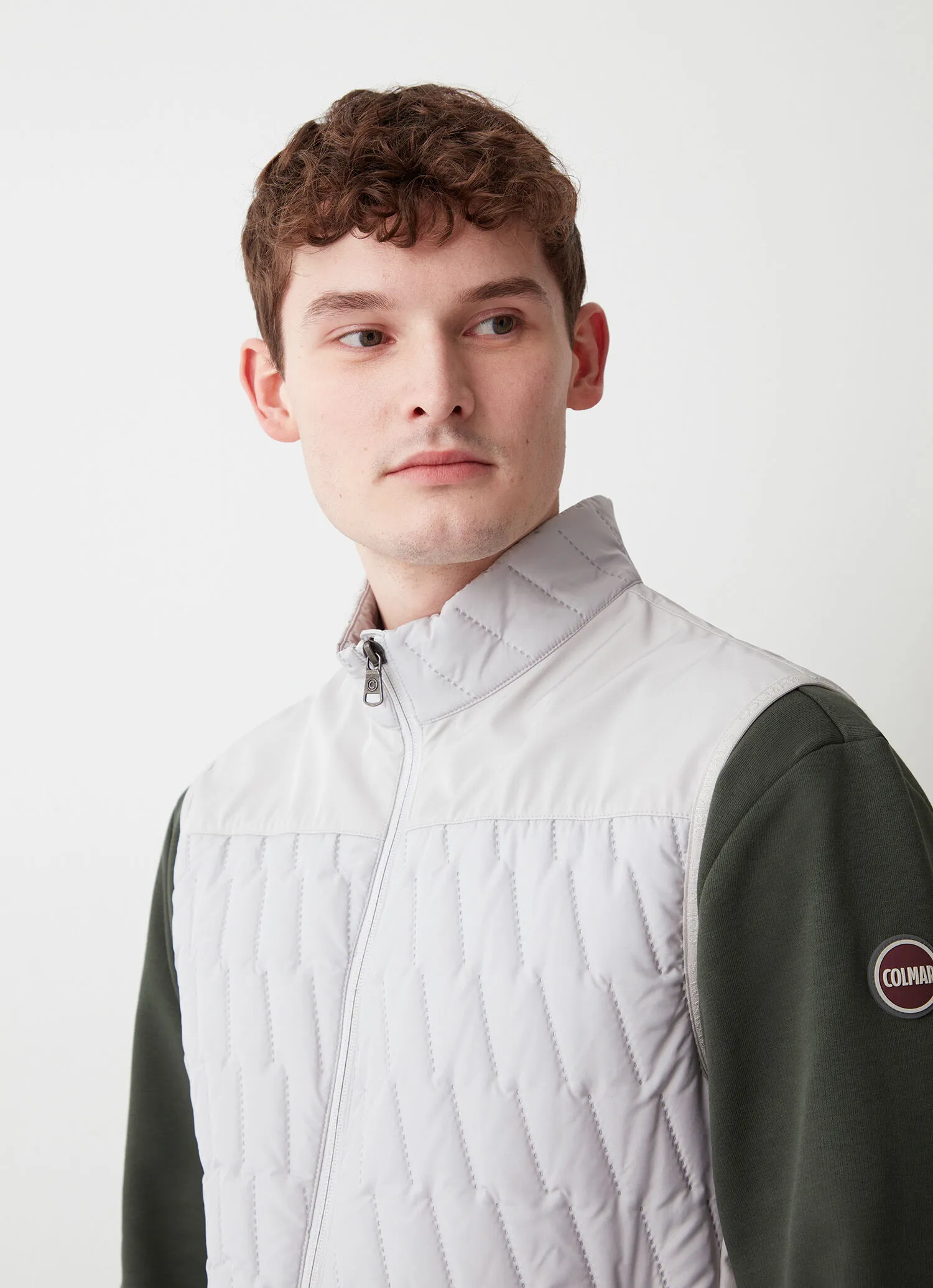 Quilted gilet with softshell inserts