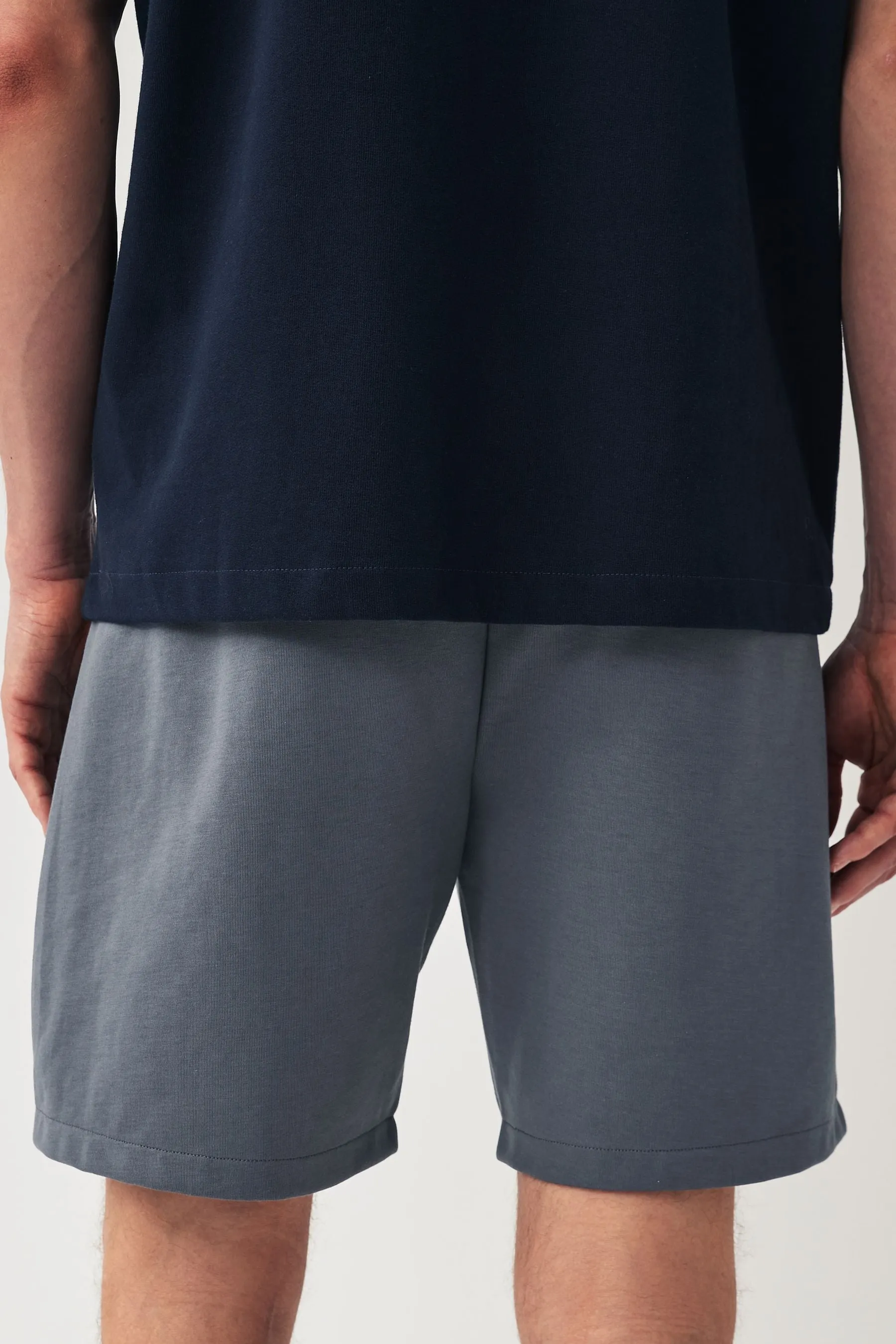 Shorts in jersey con tasche con zip