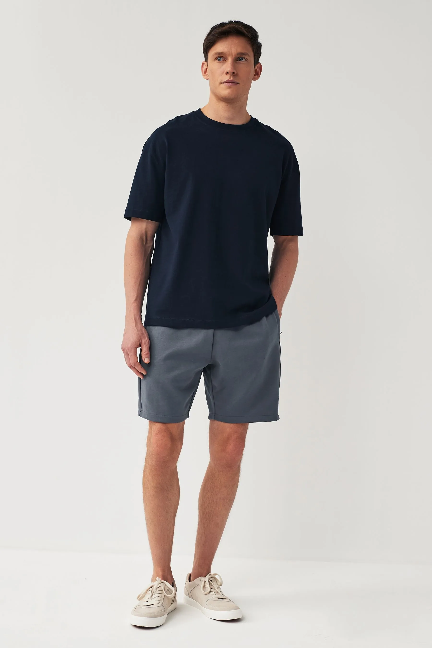 Shorts in jersey con tasche con zip